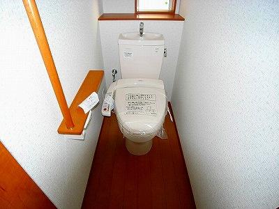 Toilet. The photograph is a property of the same manufacturer and construction