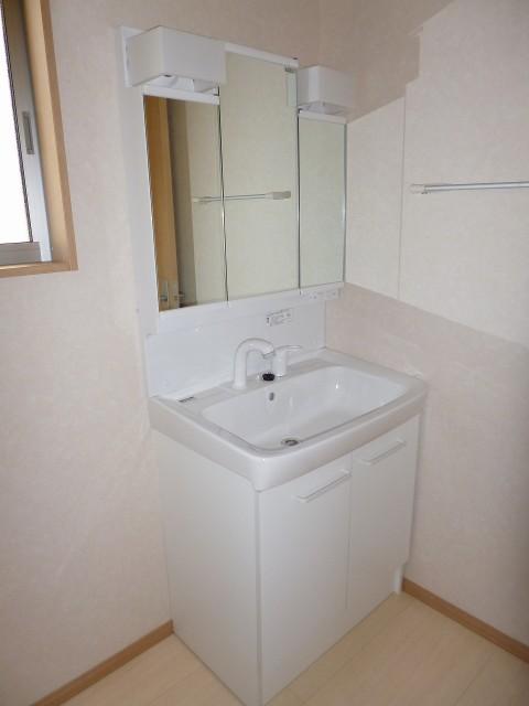 Wash basin, toilet. Washroom