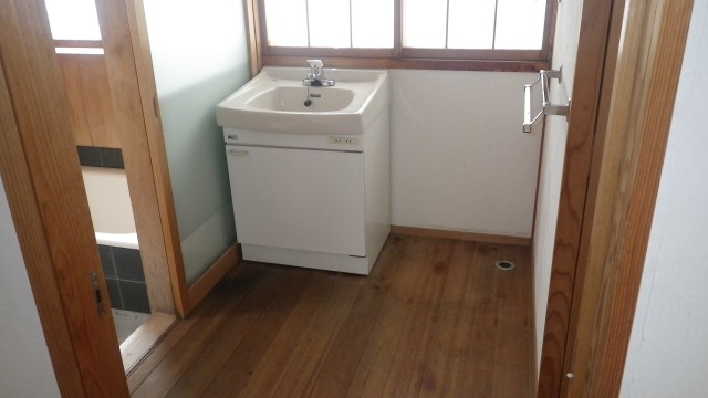 Other room space. Laundry Area and washbasin