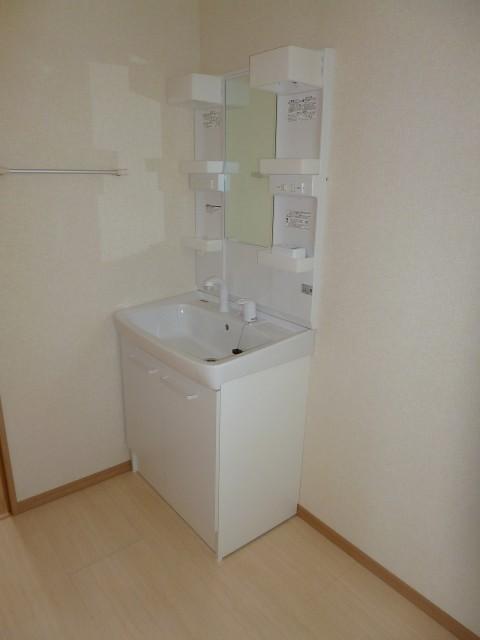 Wash basin, toilet. Wash