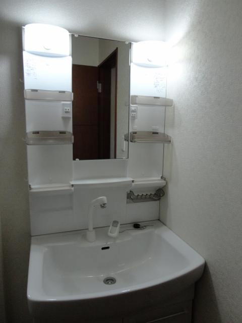 Wash basin, toilet. It is the washstand of the washroom.