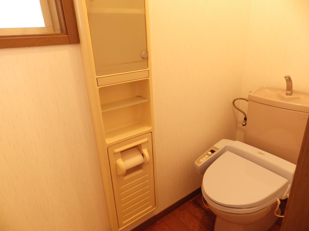 Toilet. We newly had made with warm water washing toilet seat. 
