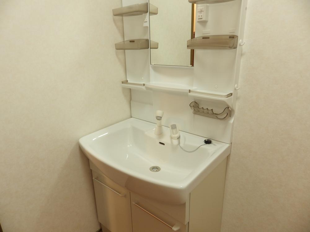 Wash basin, toilet. It is vanity of new. 