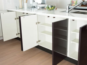 Kitchen.  [Dining side storage] It can also be used as a cupboard or pantry