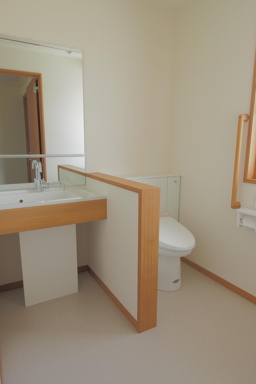 Toilet. Second floor of vanity & toilet