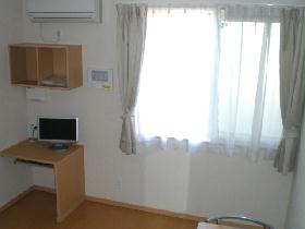 Living and room. There is also a hanging shelf storage. Also equipped with curtain.