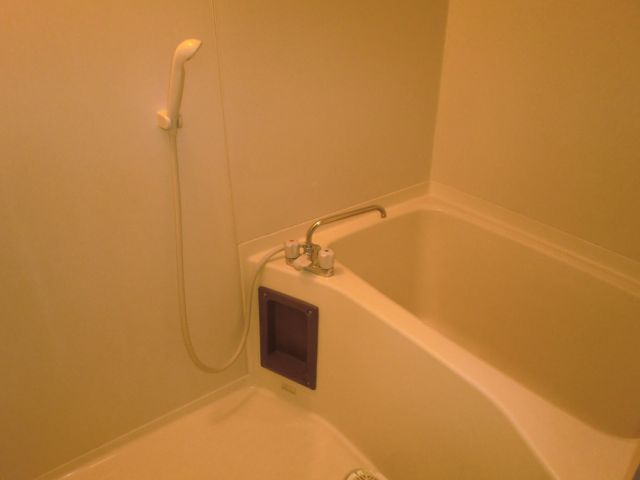 Bath. It is a clean bathroom