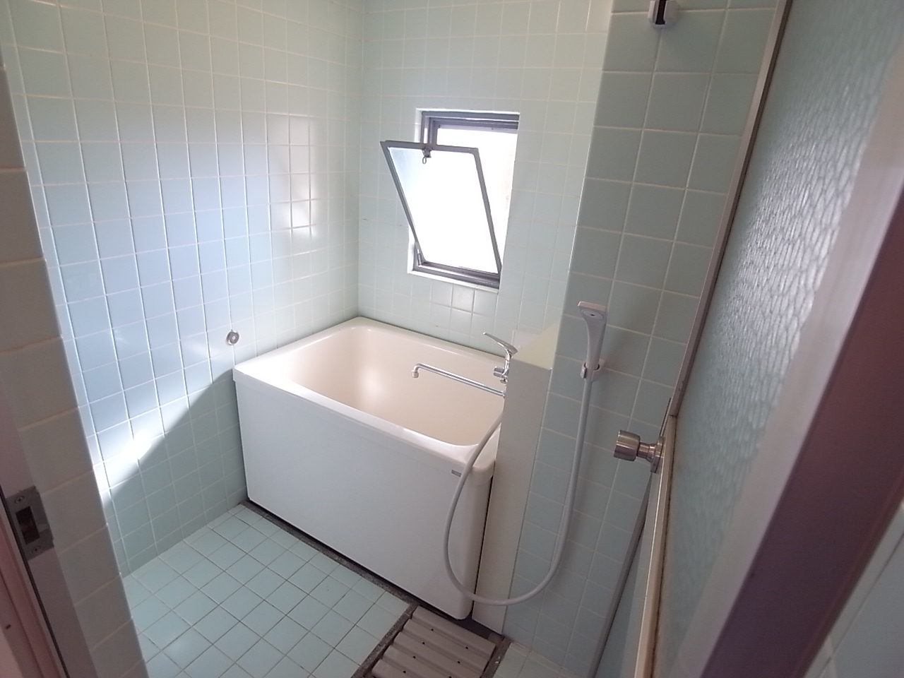 Bath. Bathroom with ventilation is likely to window