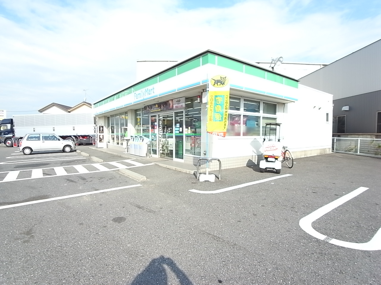 Convenience store. FamilyMart Nakauzura store up (convenience store) 1070m