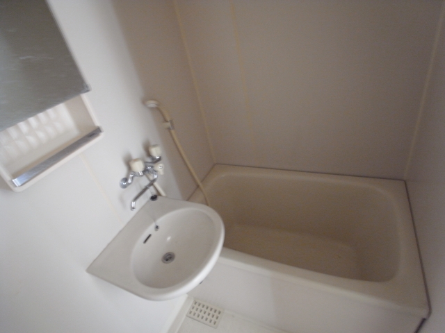 Bath. It is clean are easy because it is along with wash basin ^^
