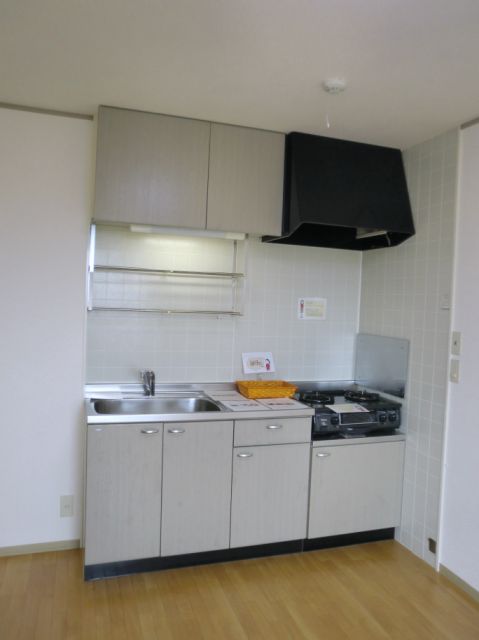 Kitchen. It comes with a gas stove. 