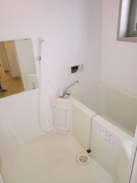 Bath. It is clear a bathroom with a ventilation window. 