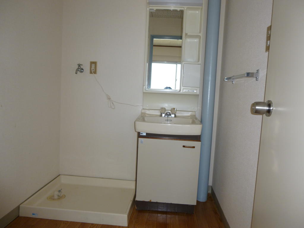 Washroom. There is also a space that small items can be stored, Also it comes with a mirror