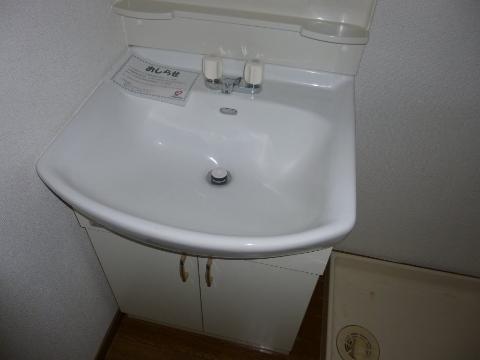 Other room space. Wash basin