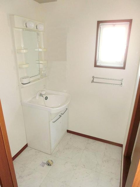 Washroom. Basin with a small window