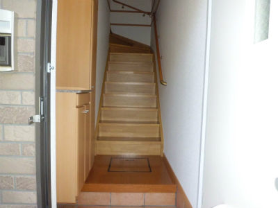 Entrance. Staircase is in the room. 