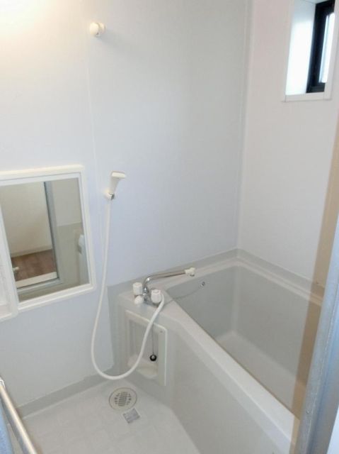 Bath. Small window with a bathroom