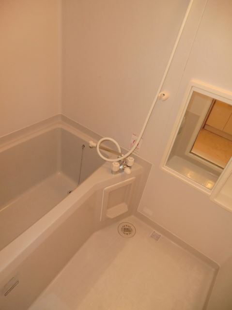 Bath. It is a bathroom that can be comfortably. 