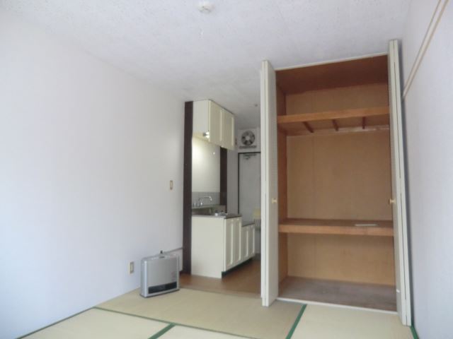 Living and room. It is spacious can space. 