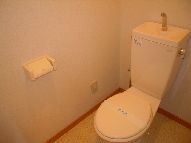 Toilet. Same type of room