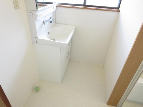 Wash basin, toilet. We established undressing wash room wash basin there is also a washing machine inside the room space