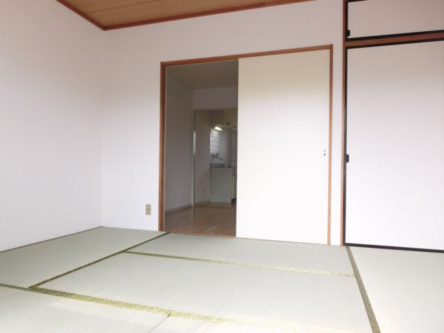 Living and room. There is a sliding door between the dining. 