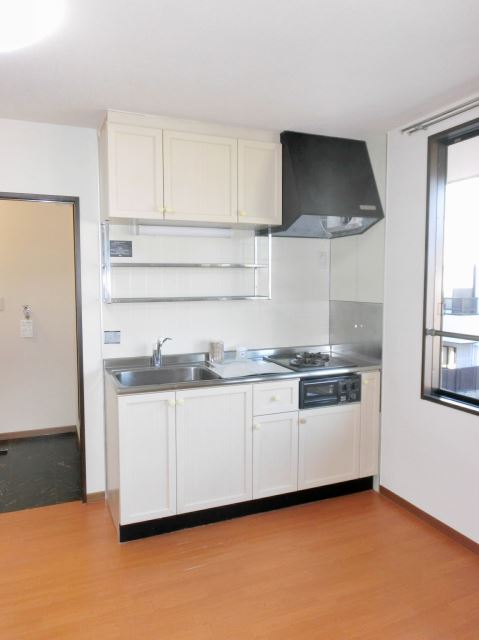 Kitchen. Bright kitchen space there is a window. 