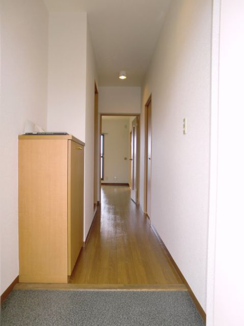 Entrance. Entrance with convenient cupboard for storage of shoes. 
