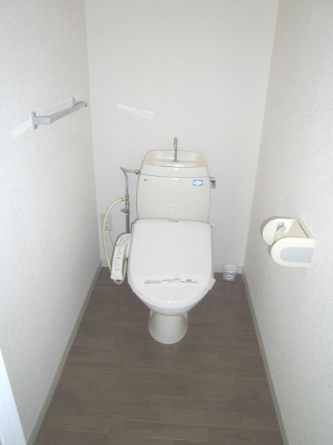 Toilet. I'm happy warm water washing toilet seat.