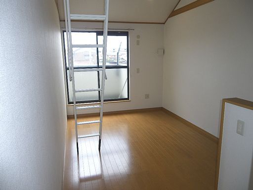 Living and room. The window is large, bright room.