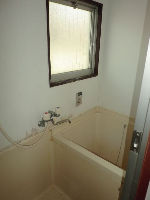 Bath. Small window is also available ventilation good bath. 