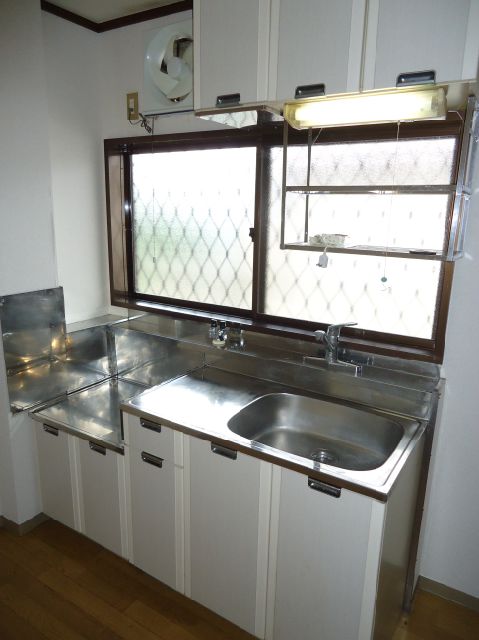 Kitchen. Happily cooking in bright kitchen! 