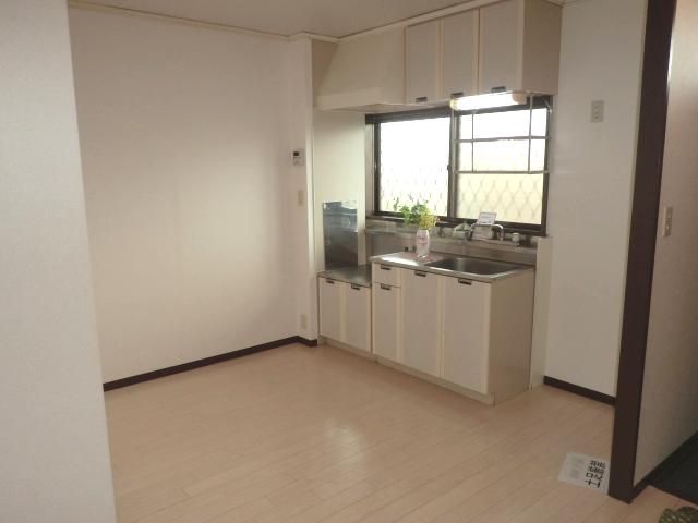 Living and room. It is bright and clean dining in a white floor. 