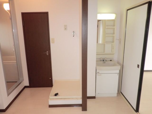 Washroom. It is with also includes a vanity. 