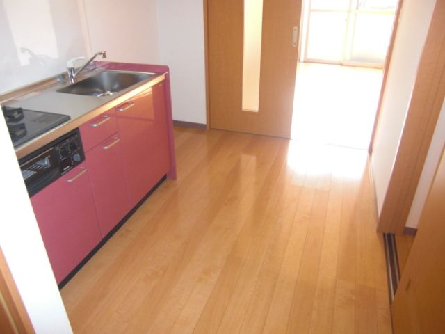 Kitchen. Stylish kitchen. Passage is also wide. 
