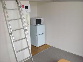 Living and room. refrigerator, It is with microwave