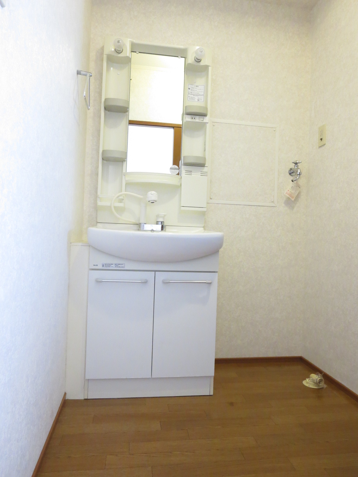 Washroom. It is with a convenient shower head