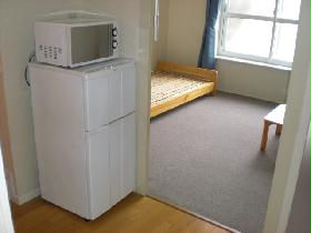 Living and room. refrigerator, It is with microwave