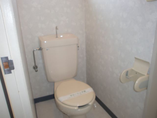 Toilet. Attach Washlet. 