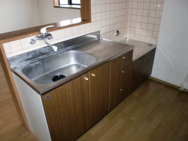 Kitchen. It is reasonable space to good sink easy to use. 