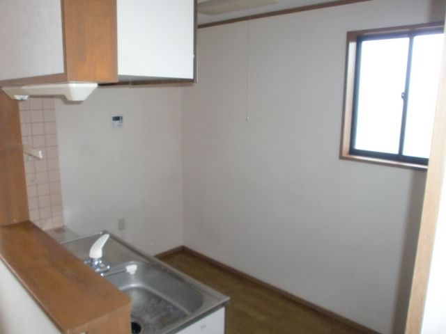 Kitchen. During the day with a window is a bright kitchen space. 