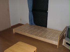 Living and room. Bed, tv set, It is with table