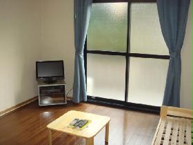 Living and room. The room is also bright with large windows