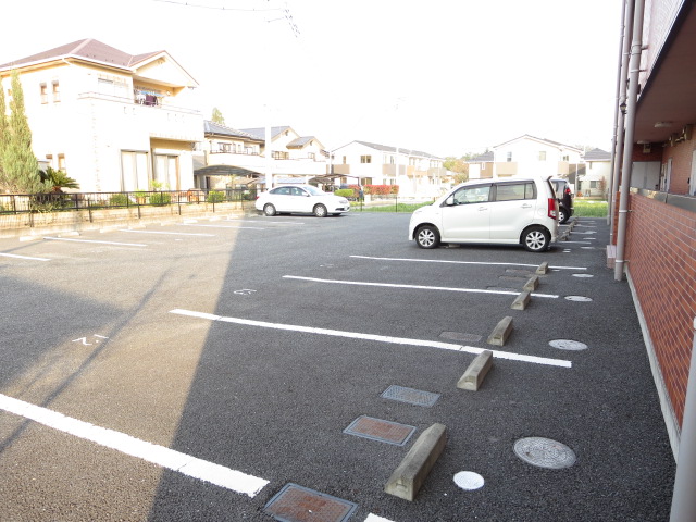 Parking lot. There is a parking space with a space. 