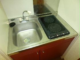 Kitchen. It is an electric stove 2-neck