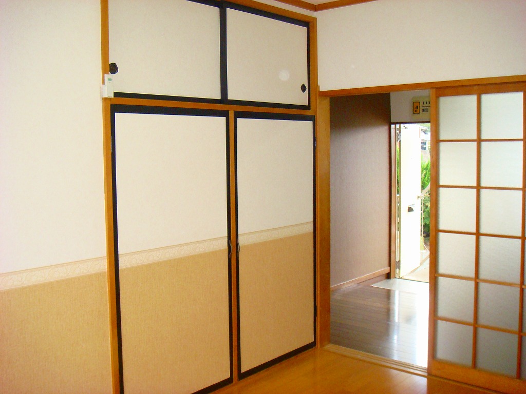 Living and room. Image is a photograph because it is in renovation. 