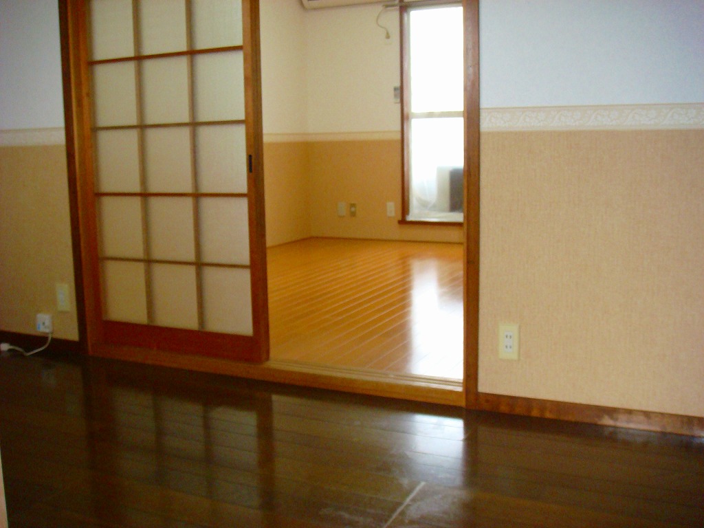 Living and room. Image is a photograph because it is in renovation. 