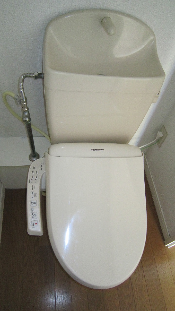 Toilet. Brand new Warm water washing toilet seat