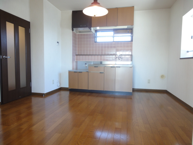 Kitchen. Spacious dining room angle is brighter with a window