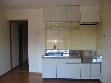 Kitchen. Kitchen around is sticking gentle ivory color of the tile